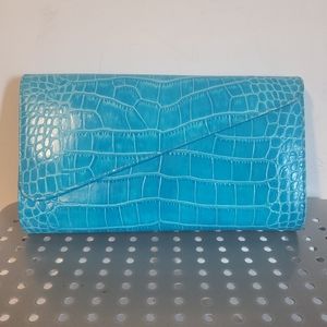 NWOT DANIER LEATHER CLUTCH WITH CROSSBODY STRAP